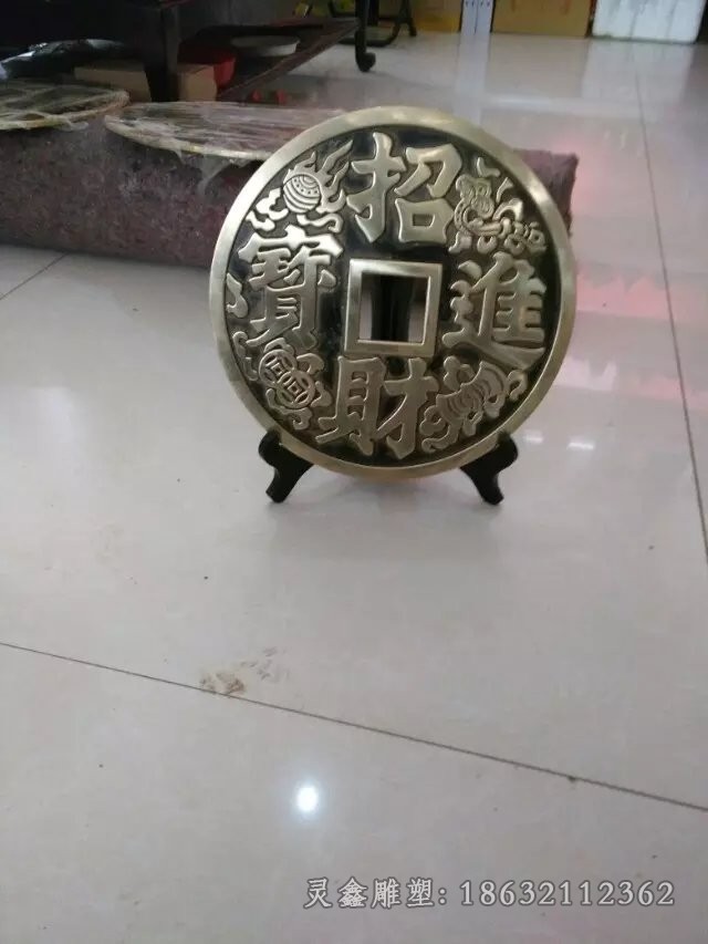 抽象古代銅錢標(biāo)志銅雕